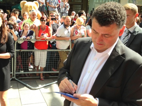 Stevie Moffat signing his autograph for me